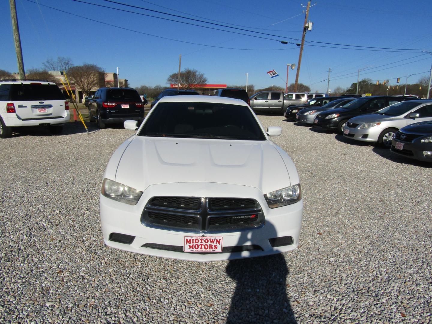 2014 White Dodge Charger SE (2C3CDXBG5EH) with an 3.6L V6 DOHC 24V engine, Automatic transmission, located at 15016 S Hwy 231, Midland City, AL, 36350, (334) 983-3001, 31.306210, -85.495277 - Photo#1